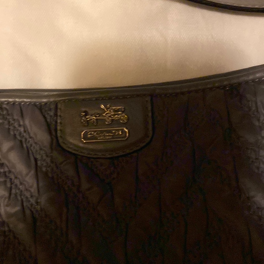 Authentic gray Coach handbag.
